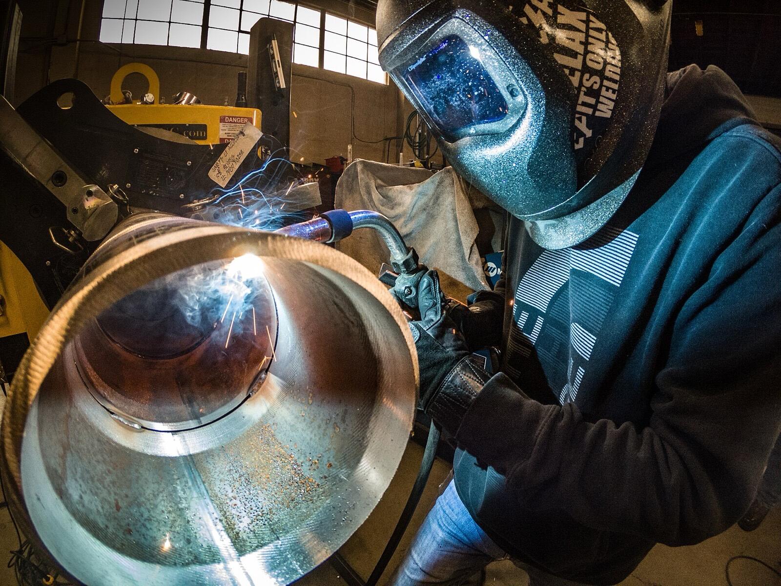 MIG welding on a steel pipe